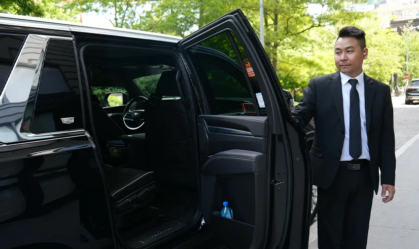 Luxury Dallas to College Station city to city black car service with private chauffeur and executive vehicles