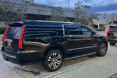 Luxury Dallas to College Station black car service for corporate travel campus visits and executive chauffeur transportation